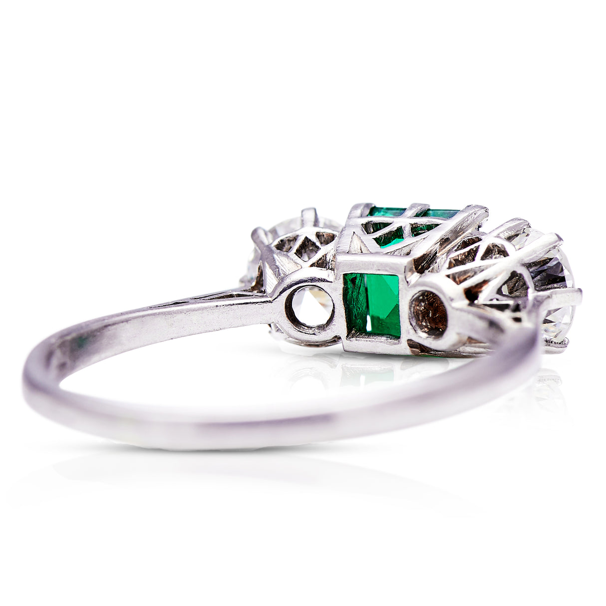 Fine Quality | Art Deco, Platinum, Emerald and Diamond Three Stone Ring