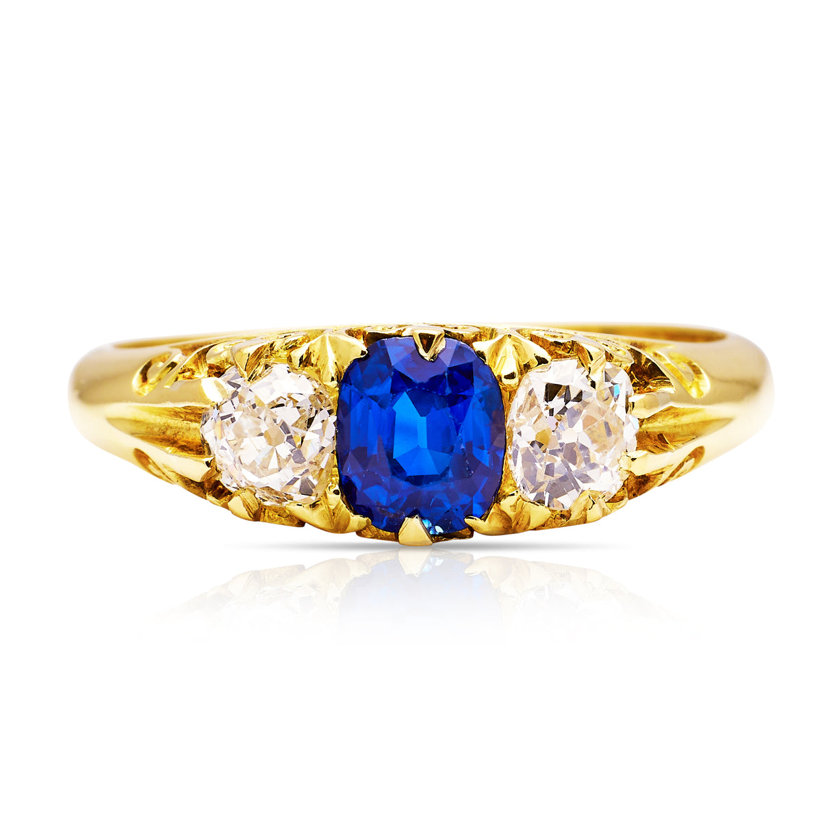 Sapphire and diamond three stone ring, front view. 