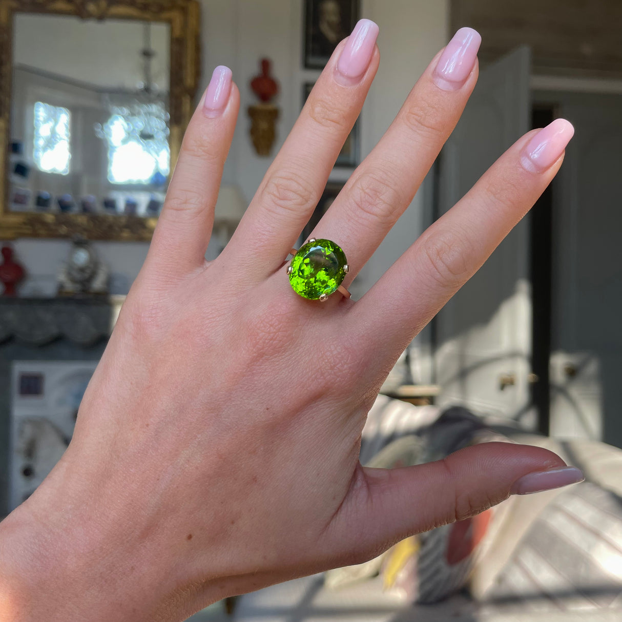French | A Large Oval 12ct Peridot Ring, 18ct Gold