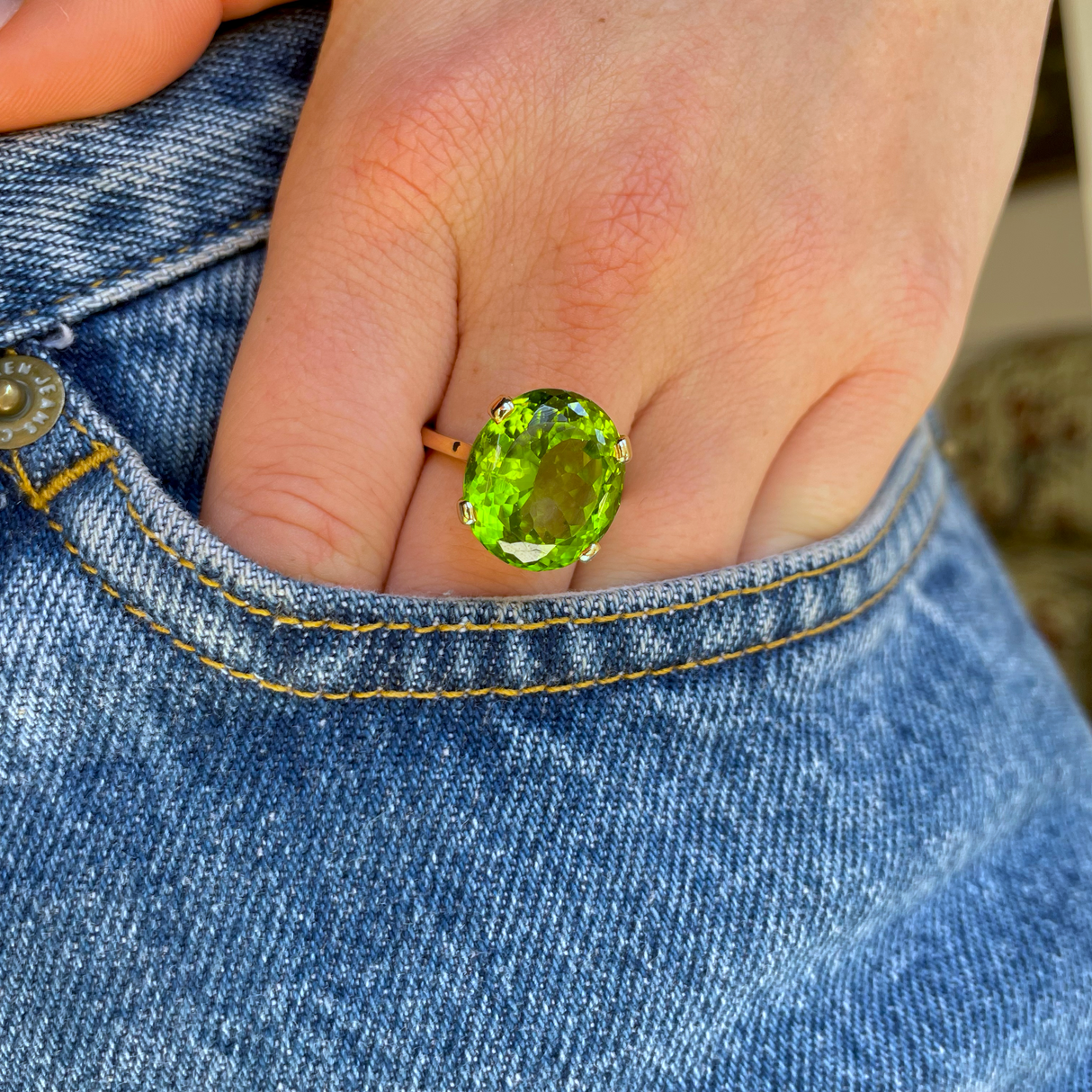 French | A Large Oval 12ct Peridot Ring, 18ct Gold