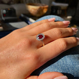 1920s, Oval Ruby and Diamond Cluster Engagement Ring, 18ct Yellow Gold