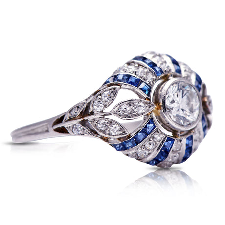 Untreated Antique Edwardian, Platinum, Sapphire and Diamond Bombé Ring