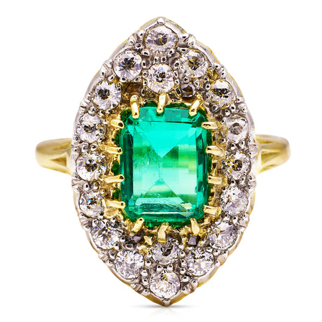 Emerald and diamond navette ring, front view. 