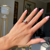 Retro Tiffany & Co. ruby and diamond ring worn on hand.
