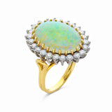 Vintage white Australian opal and diamond ring, side view. 