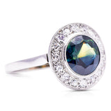 green yellow sapphire and diamond cluster ring, side view. 