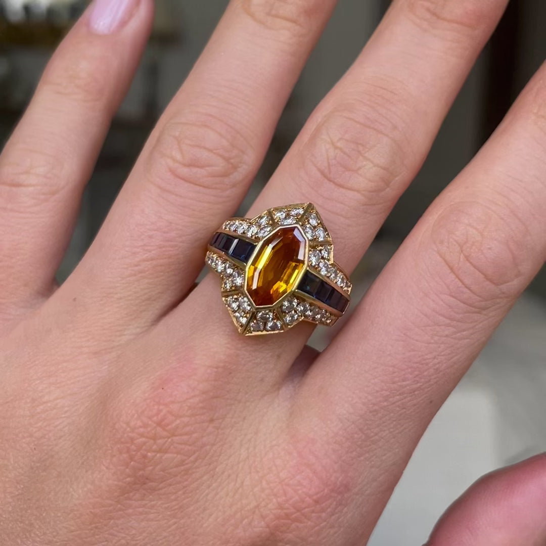 Vintage chaumet | orange sapphire, diamond and blue sapphire cocktail ring, signed