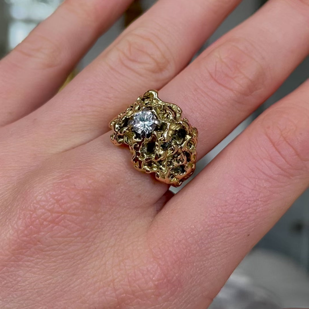 Vintage textured 18ct yellow gold nugget diamond ring, worn on hand and rotated to give perspective.