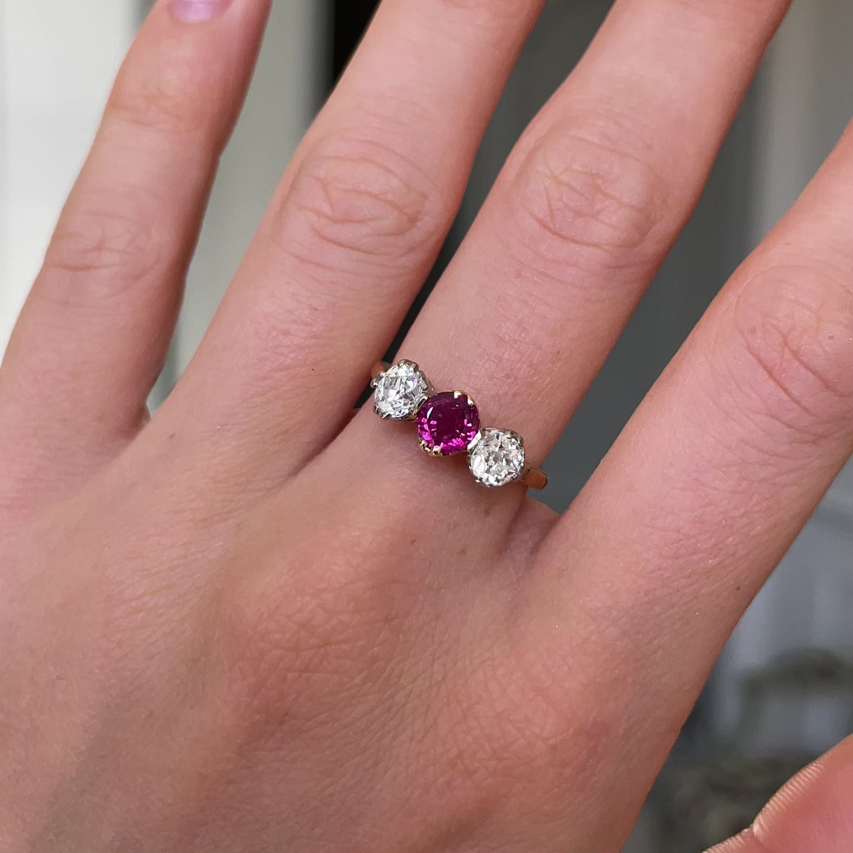 Edwardian, 18ct gold, platinum, ruby and diamond three-stone ring